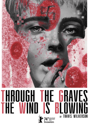 風仍在墳上吹拂